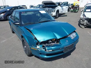1995 Saturn SL with VIN 1G8ZK5277SZ320711, listed as a IAAI auction lot 42115543 with 77,558 mi miles and . Bid and sale history available at DreamBid. Image 6.