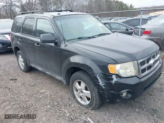 2011 Ford Escape XLT with VIN 1FMCU9D79BKB81857, listed as a IAAI auction lot 41736042 with 999,999 mi miles. Bid and sale history available at carsss.com. Image 1.