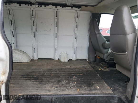 2005 Chevrolet Express Cargo z VIN 1GCFG15X651115978, wystawiony jako Copart lot #88572355 z przebiegiem 149 920 mil mil oraz Szkoda całkowita • Salvage title. Historia ofert i sprzedaży dostępna na DreamBid. Obrazek 11.