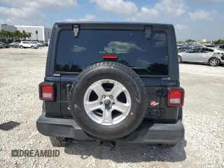 2019 Jeep Wrangler Unlimited Sport S with VIN 1C4HJXDG2KW570078, listed as a Copart auction lot 51119485 with 65,860 mi miles and Salvage title. Bid and sale history available at DreamBid. Image 6.