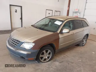 2007 Chrysler Pacifica Touring z VIN 2A8GM68X87R162765, wystawiony jako IAAI lot #42382704 z przebiegiem 160 768 mil mil oraz . Historia ofert i sprzedaży dostępna na DreamBid. Obrazek 2.