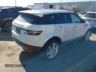 2014 Land Rover Range Rover Evoque Pure Plus z VIN SALVP2BG2EH892759, wystawiony jako IAAI lot #41538897 z przebiegiem 116 684 mil mil oraz . Historia ofert i sprzedaży dostępna na DreamBid. Obrazek 4.