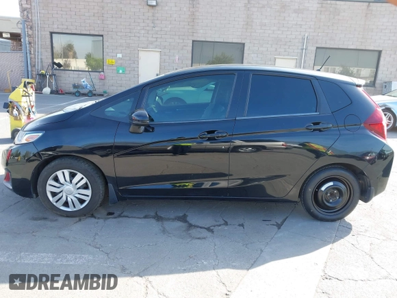 2015 Honda Fit LX with VIN 3HGGK5G5XFM737172, listed as a IAAI auction lot 42053332 with 80,690 mi miles. Bid and sale history available at carsss.com. Image 14.