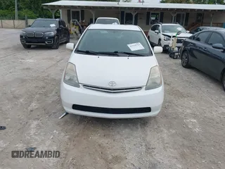 2006 Toyota Prius with VIN JTDKB20U567529834, listed as a IAAI auction lot 42119723 with 209,638 mi miles. Bid and sale history available at carsss.com. Image 6.