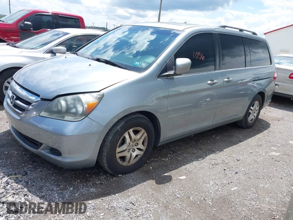 2007 Honda Odyssey EX-L with VIN 5FNRL38747B121059, listed as a IAAI auction lot 42211056 with 171,838 mi miles and . Bid and sale history available at DreamBid. Image 2.
