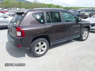 2014 Jeep Compass Latitude with VIN 1C4NJDEBXED622352, listed as a IAAI auction lot 42130403 with 149,024 mi miles. Bid and sale history available at carsss.com. Image 4.