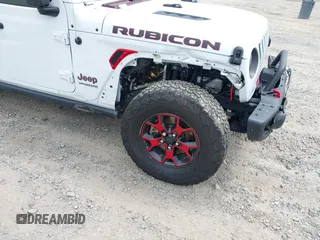 2021 Jeep Wrangler Unlimited Rubicon z VIN 1C4HJXFG1MW577829, wystawiony jako IAAI lot #41997002 z przebiegiem 26 443 mil mil oraz . Historia ofert i sprzedaży dostępna na DreamBid. Obrazek 6.