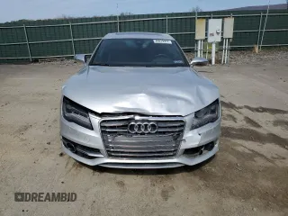 2015 Audi S7 with VIN WAUW2AFC8FN023143, listed as a Copart auction lot 49879934 with 67,651 mi miles. Bid and sale history available at carsss.com. Image 5.