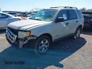 2008 Ford Escape XLT with VIN 1FMCU93198KC12899, listed as a IAAI auction lot 41768951 with 202,830 mi miles. Bid and sale history available at carsss.com. Image 2.