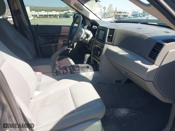 2007 Jeep Grand Cherokee Laredo with VIN 1J8HR48PX7C660601, listed as a IAAI auction lot 41652509 with 131,556 mi miles. Bid and sale history available at carsss.com. Image 5.