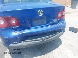 2008 Volkswagen Jetta S z VIN 3VWJZ71K38M015293, wystawiony jako IAAI lot #42438127 z przebiegiem 215 376 mil mil oraz . Historia ofert i sprzedaży dostępna na DreamBid. Obrazek 6.