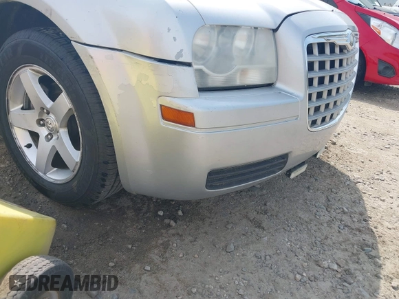 2006 Chrysler 300 with VIN 2C3KA43R96H505406, listed as a IAAI auction lot 42047014 with 257,628 mi miles. Bid and sale history available at carsss.com. Image 6.