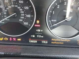 2014 BMW 3 Series 335i xDrive with VIN WBA3B9C52EJ466045, listed as a IAAI auction lot 41281384 with 136,329 mi miles. Bid and sale history available at carsss.com. Image 15.