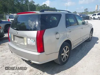 2004 Cadillac SRX with VIN 1GYEE63A840185428, listed as a IAAI auction lot 42088949 with 207,821 mi miles. Bid and sale history available at carsss.com. Image 4.