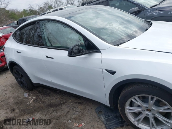 2023 Tesla Model Y Long Range with VIN 7SAYGDEE2PA145398, listed as a IAAI auction lot 41546573 with 20,812 mi miles and . Bid and sale history available at carsss.com. Image 12.