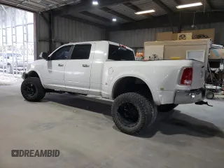 2014 Ram 3500 Laramie with VIN 3C63RRML4EG198281, listed as a Copart auction lot 78450724 with 212,689 mi miles and Salvage Title. Bid and sale history available at carsss.com. Image 2.