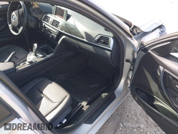 2018 BMW 3 Series 320i with VIN WBA8A9C55JAH14990, listed as a IAAI auction lot 41719896 with 77,472 mi miles. Bid and sale history available at carsss.com. Image 5.