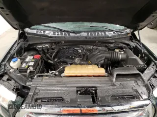 2015 Ford F-150 XLT z VIN 1FTEW1E81FKE92611, wystawiony jako Copart lot #55768005 z przebiegiem 118 600 mil mil oraz Szkoda całkowita • Salvage title. Historia ofert i sprzedaży dostępna na DreamBid. Obrazek 11.