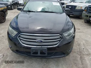 2014 Ford Taurus SE z VIN 1FAHP2D81EG140072, wystawiony jako IAAI lot #42124900 z przebiegiem 116 560 mil mil oraz . Historia ofert i sprzedaży dostępna na DreamBid. Obrazek 6.