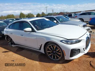 2023 BMW i4 eDrive40 z VIN WBY73AW08PFN72118, wystawiony jako IAAI lot #41849570 z przebiegiem 27 118 mil mil oraz . Historia ofert i sprzedaży dostępna na DreamBid. Obrazek 14.