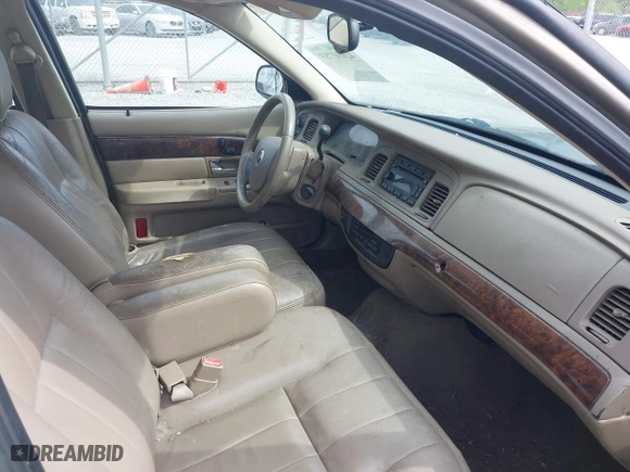 2005 Mercury Grand Marquis LS Premium with VIN 2MEFM75W35X654244, listed as a IAAI auction lot 42090783 with 120,033 mi miles. Bid and sale history available at carsss.com. Image 5.