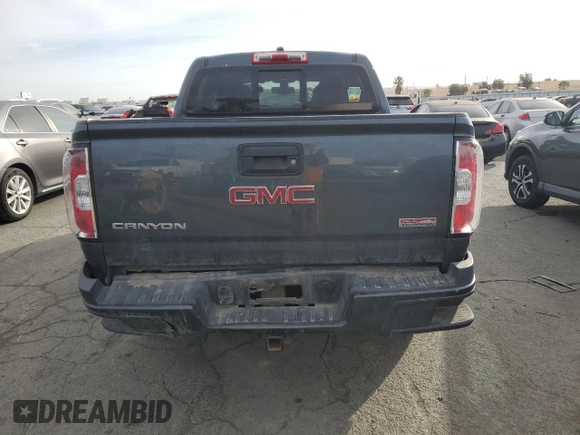 2015 GMC Canyon 4WD SLE with VIN 1GTG6BE31F1221315, listed as a Copart auction lot 78237394 with 93,411 mi miles and Salvage Title. Bid and sale history available at carsss.com. Image 6.