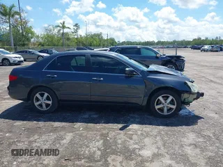 2005 Honda Accord EX z VIN 1HGCM567X5A173921, wystawiony jako IAAI lot #42261616 z przebiegiem 162 553 mil mil oraz . Historia ofert i sprzedaży dostępna na DreamBid. Obrazek 14.