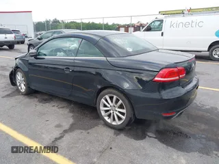 2015 Volkswagen Eos Komfort with VIN WVWBW8AH5FV004034, listed as a IAAI auction lot 41981978 with 106,450 mi miles and . Bid and sale history available at DreamBid. Image 3.