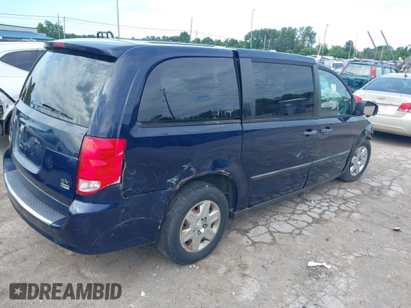 2013 Ram Cargo Van Tradesman with VIN 2C4JRGAG7DR781870, listed as a IAAI auction lot 39762348 with 114,717 mi miles and . Bid and sale history available at DreamBid. Image 4.