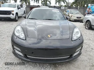 2013 Porsche Panamera с VIN WP0AA2A75DL016661, выставлен на аукционе Copart как лот 48977385 с пробегом 55 914 миль миль и Списание • Salvage title. История ставок и продаж доступна на DreamBid. Изображение 5.