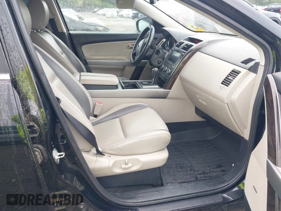 2012 Mazda CX-9 Grand Touring z VIN JM3TB3DV1C0360212, wystawiony jako IAAI lot #42232584 z przebiegiem 99 582 mil mil oraz . Historia ofert i sprzedaży dostępna na DreamBid. Obrazek 5.