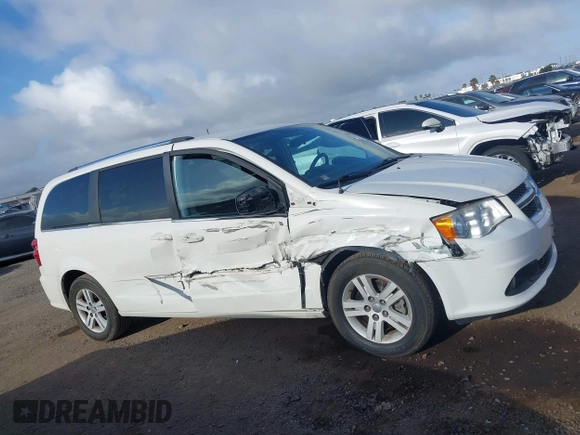 2013 Dodge Grand Caravan Crew with VIN 2C4RDGDG4DR606263, listed as a IAAI auction lot 41898351 with 127,044 mi miles and . Bid and sale history available at DreamBid. Image 13.