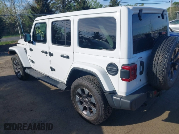 2018 Jeep Wrangler Unlimited Sahara z VIN 1C4HJXEG9JW227829, wystawiony jako IAAI lot #42099356 z przebiegiem 130 259 mil mil oraz . Historia ofert i sprzedaży dostępna na DreamBid. Obrazek 3.