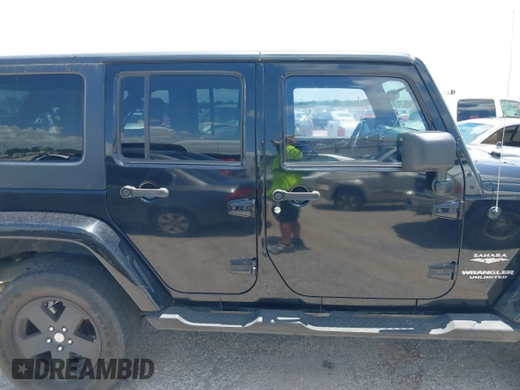 2007 Jeep Wrangler Unlimited Sahara with VIN 1J4GA59187L187656, listed as a IAAI auction lot 42554114 with 200,840 mi miles and . Bid and sale history available at DreamBid. Image 13.