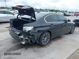 2018 BMW 5 Series 540i z VIN WBAJE5C51JWA98514, wystawiony jako IAAI lot #41963168 z przebiegiem 78 755 mil mil oraz . Historia ofert i sprzedaży dostępna na DreamBid. Obrazek 4.