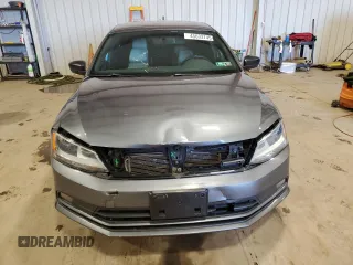 2015 Volkswagen Jetta SE with VIN 3VWD17AJ2FM421669, listed as a Copart auction lot 45633745 with 147,467 mi miles and Salvage title. Bid and sale history available at DreamBid. Image 5.