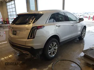2020 Cadillac XT5 Premium Luxury FWD with VIN 1GYKNCRS5LZ172325, listed as a IAAI auction lot 41275366 with 102,796 mi miles. Bid and sale history available at carsss.com. Image 4.
