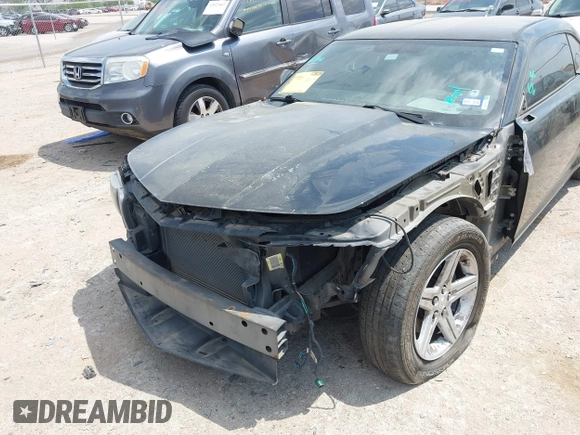 2012 Chevrolet Camaro 1LT z VIN 2G1FB1E30C9198434, wystawiony jako IAAI lot #42049821 z przebiegiem 180 813 mil mil oraz . Historia ofert i sprzedaży dostępna na DreamBid. Obrazek 6.