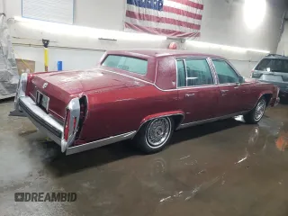 1988 Cadillac Brougham z VIN 1G6DW51Y2JR766782, wystawiony jako Copart lot #83797924 z przebiegiem 63 601 mil mil oraz Szkody całkowita. Historia ofert i sprzedaży dostępna na DreamBid. Obrazek 3.