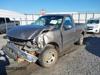 2002 Ford F-150 XL with VIN 1FTRF17W02NB01695, listed as a IAAI auction lot 41230523 with 398,649 mi miles. Bid and sale history available at carsss.com. Image 6.