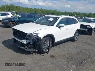 2021 Mazda CX-9 Grand Touring z VIN JM3TCBDY2M0541290, wystawiony jako IAAI lot #42216643 z przebiegiem 38 661 mil mil oraz . Historia ofert i sprzedaży dostępna na DreamBid. Obrazek 2.