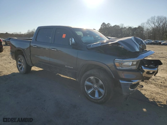 2021 Ram 1500 Laramie with VIN 1C6SRFJTXMN665384, listed as a Copart auction lot 42037685 with 76,836 mi miles and Salvage Title. Bid and sale history available at carsss.com. Image 4.