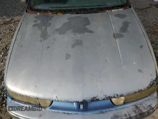 1994 Oldsmobile Cutlass z VIN 1G3WH55M1RD353266, wystawiony jako Copart lot #74058544 z przebiegiem 157 494 mil mil oraz Szkody całkowita. Historia ofert i sprzedaży dostępna na DreamBid. Obrazek 11.