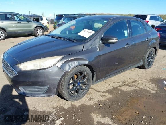 2016 Ford Focus SE z VIN 1FADP3F27GL321507, wystawiony jako IAAI lot #41278203 z przebiegiem 157 910 mil mil oraz . Historia ofert i sprzedaży dostępna na DreamBid. Obrazek 17.