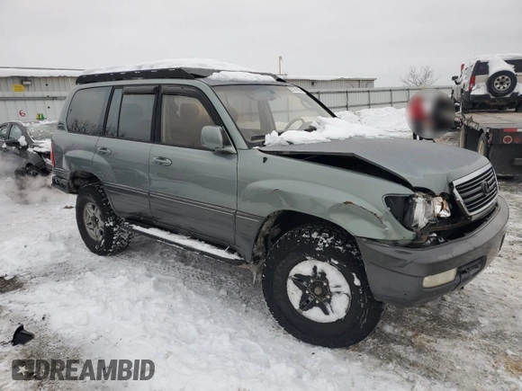 2002 Lexus LX 470 z VIN JTJHT00W923514121, wystawiony jako Copart lot #87761105 z przebiegiem 247 752 mil mil oraz Szkody całkowita. Historia ofert i sprzedaży dostępna na DreamBid. Obrazek 4.
