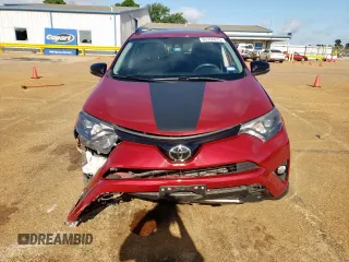 2018 Toyota RAV4 XLE with VIN 2T3RFREV7JW818661, listed as a Copart auction lot 65756615 with 56,369 mi miles and Salvage title. Bid and sale history available at DreamBid. Image 5.