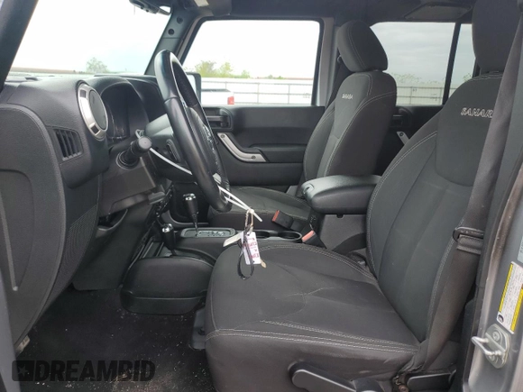 2018 Jeep Wrangler Unlimited Sahara with VIN 1C4HJWEG5JL930372, listed as a Copart auction lot 50772625 with 91,528 mi miles and Salvage title. Bid and sale history available at DreamBid. Image 7.