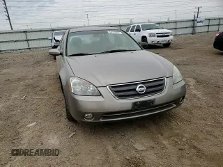 2003 Nissan Altima SE z VIN 1N4BL11D53C290140, wystawiony jako Copart lot #54163955 z przebiegiem 183 313 mil mil oraz Szkoda całkowita • Salvage title. Historia ofert i sprzedaży dostępna na DreamBid. Obrazek 13.