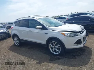 2013 Ford Escape Titanium with VIN 1FMCU0J96DUC24768, listed as a IAAI auction lot 42024198 with 93,080 mi miles. Bid and sale history available at carsss.com. Image 13.
