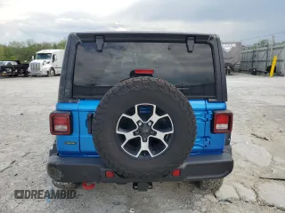 2021 Jeep Wrangler Unlimited Rubicon with VIN 1C4JJXFM7MW794325, listed as a Copart auction lot 54525315 with 43,826 mi miles and Salvage title. Bid and sale history available at DreamBid. Image 6.